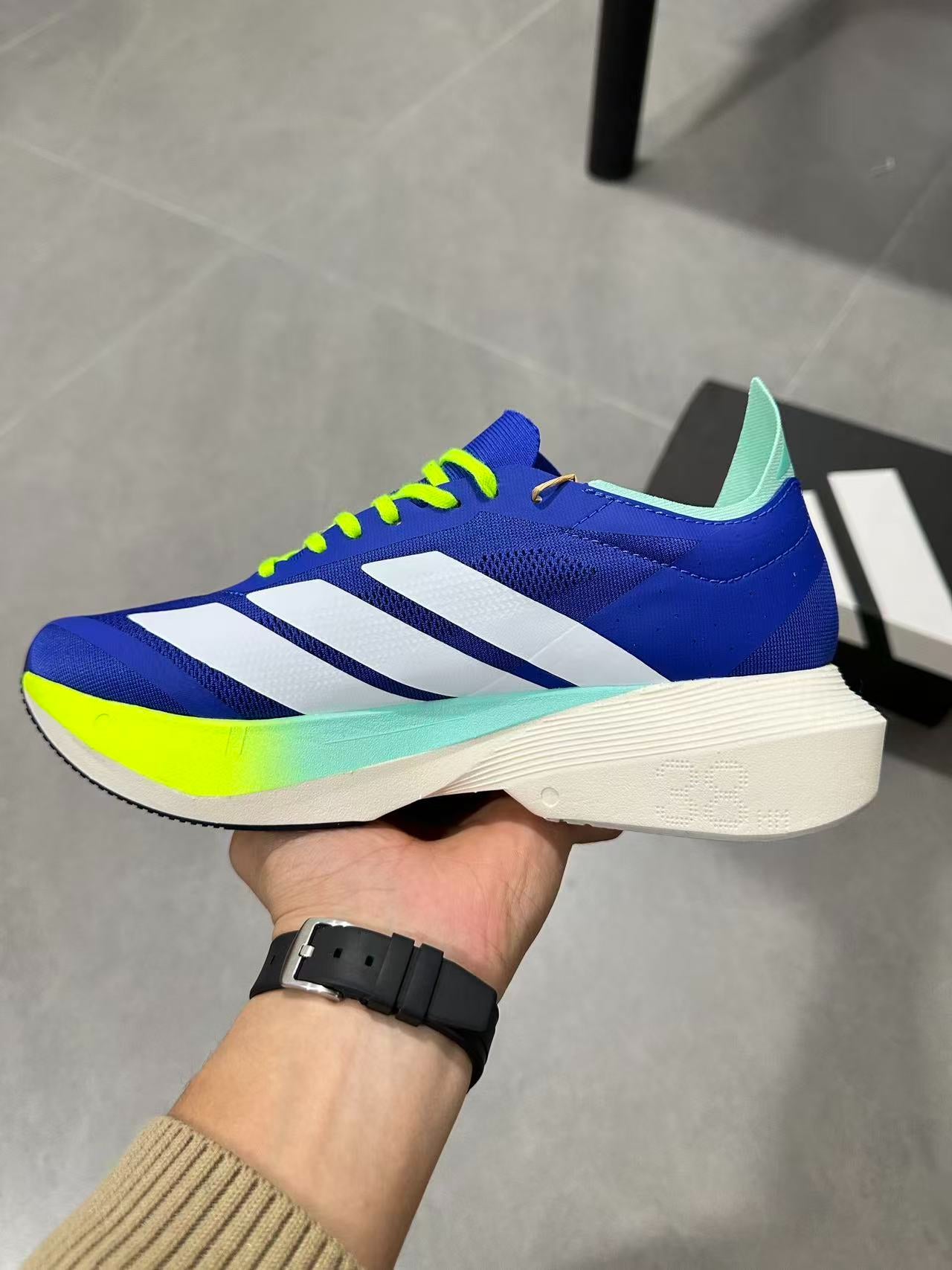 Adidas ADIZERO DRIVE RC (Royal Blue / Zero Metallic / Lucid Lemon colorway)