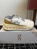 On Cloudmonster Unisex Road Running Sneakers Cream Off White Gold Band Beige Midsole Thick CloudTec Sport Shoes