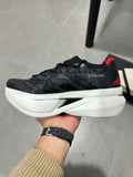 Adidas ADIZERO ADIOS PRO 4 (Core Black / Cloud White / Solar Red colorway)