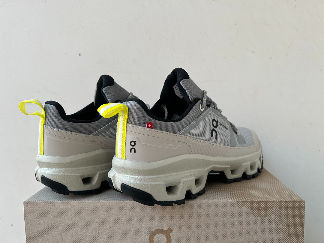 On Cloudrock Low Waterproof Hiking Shoes in Grey / Sand with Yellow Accents