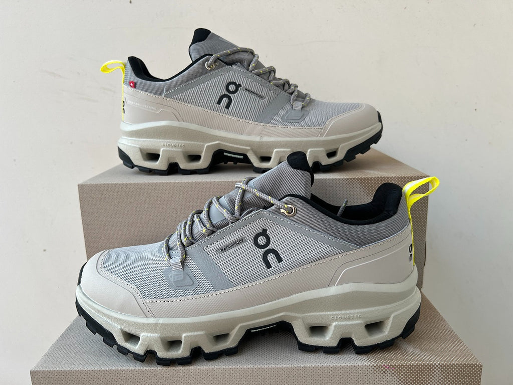 On Cloudrock Low Waterproof Hiking Shoes in Grey / Sand with Yellow Accents