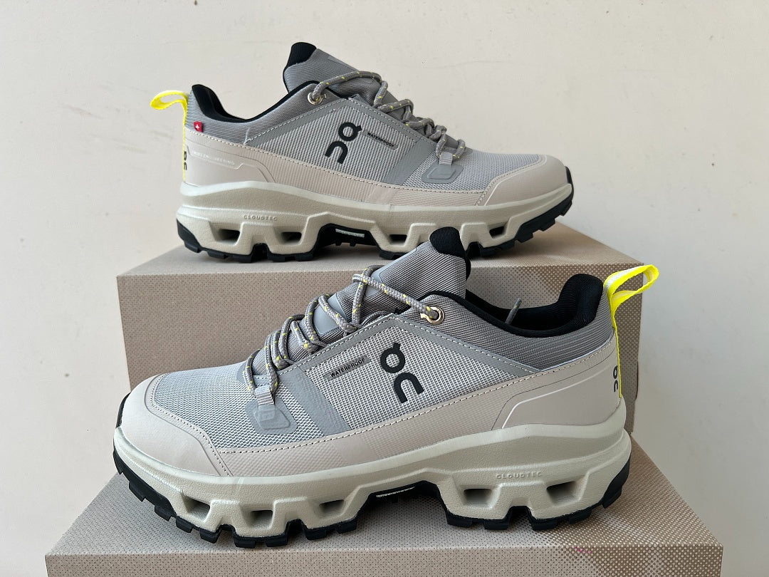 On Cloudrock Low Waterproof Hiking Shoes in Grey / Sand with Yellow Accents