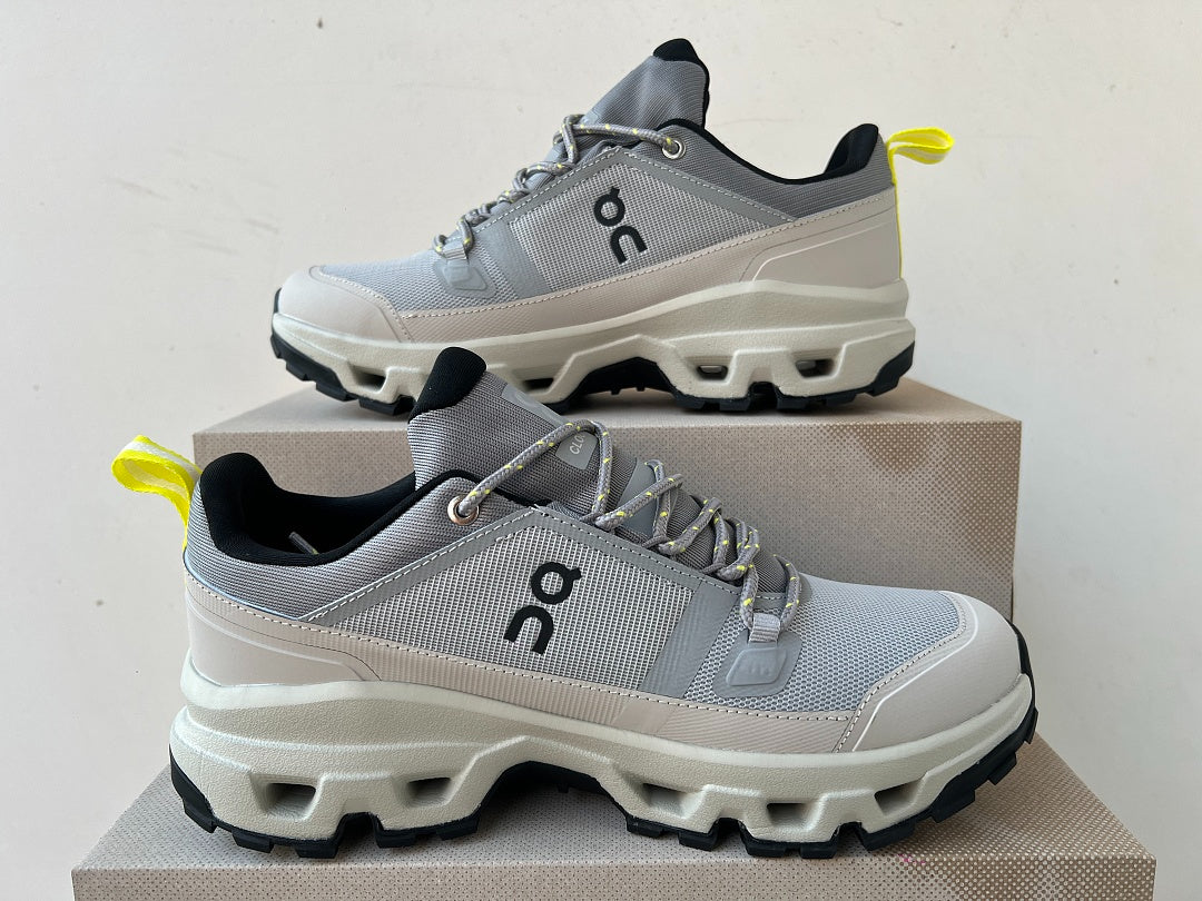 On Cloudrock Low Waterproof Hiking Shoes in Grey / Sand with Yellow Accents