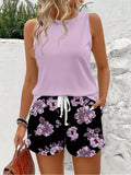 Women Featuring a Casual Crew Neck Tank Top And Floral Print Shorts, Perfect for Beach And Vacation Wear. This Chic Loose Fit Outfit Includes a Sleeveless Top And Faux Drawstring Shorts, Ideal for Spring And Summer