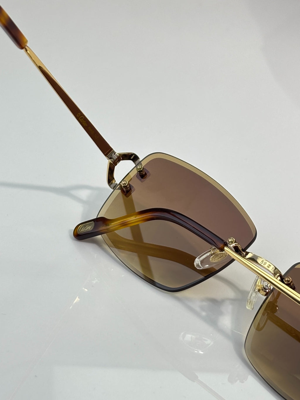 Cartier Gold-Tone Rimless Eyeglasses with Clear Lenses & Crystal-Embellished C-Logo Temples
