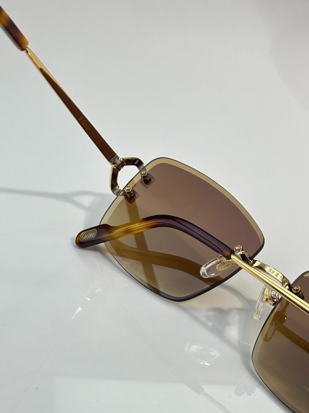 Cartier Gold-Tone Rimless Sunglasses with Gradient Brown Lenses & Diamond-Embellished Logo Temples