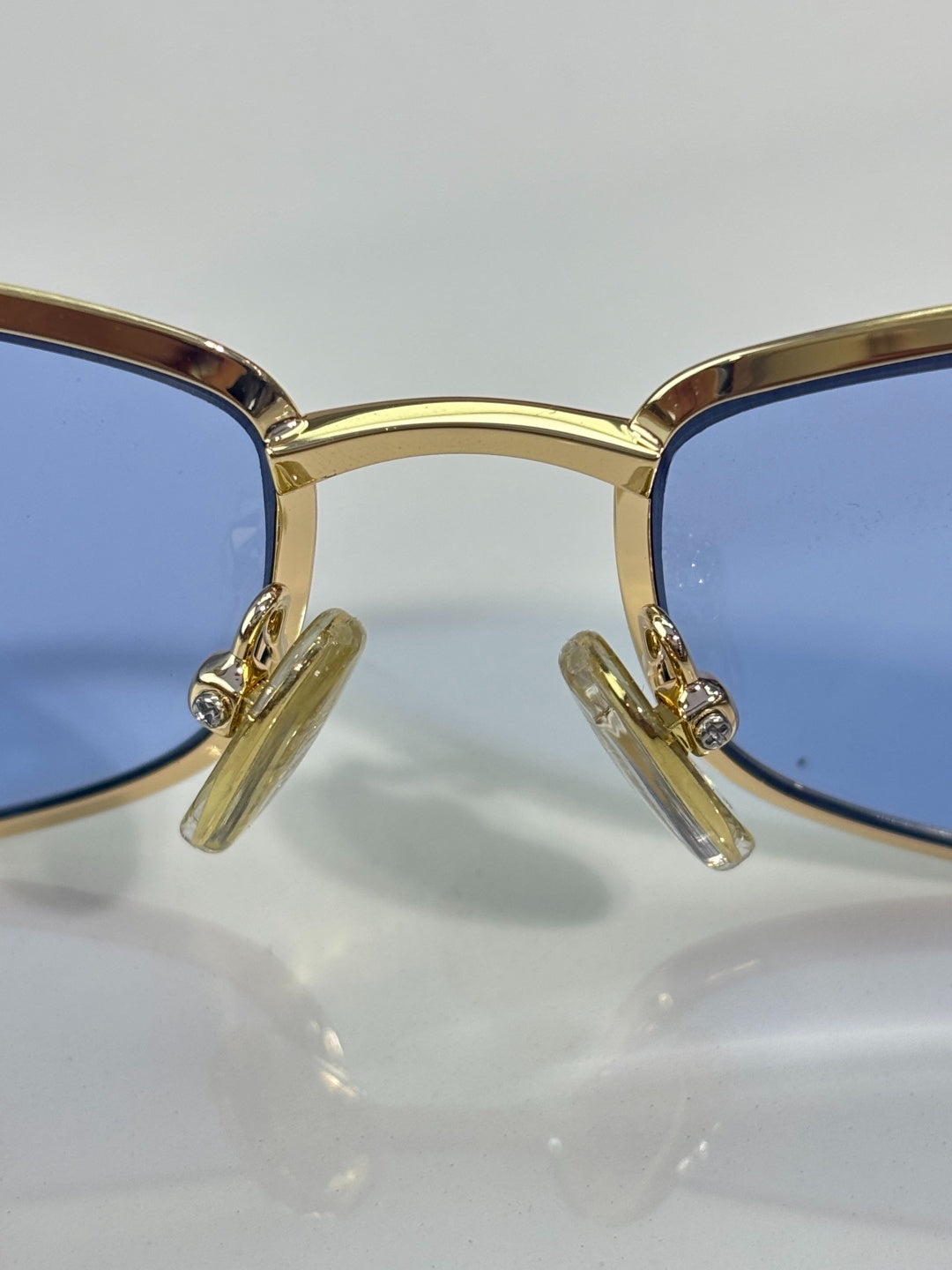 Prada Gold-Tone Metal Rectangular Sunglasses with Light Blue Lenses