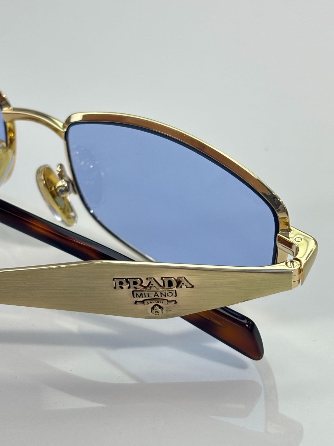Prada Gold-Tone Metal Rectangular Sunglasses with Light Blue Lenses