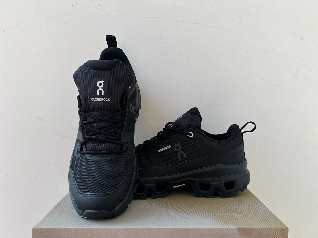 On Cloudrock Low Waterproof Hiking Shoes in All Black