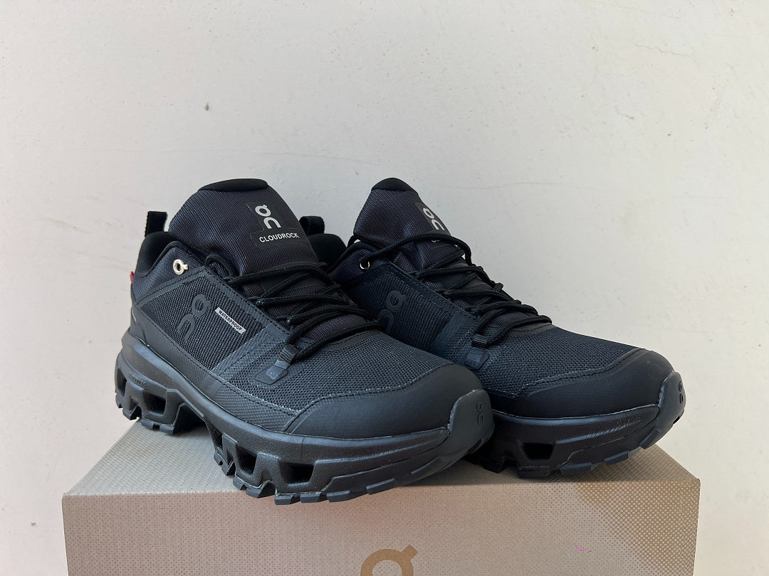 On Cloudrock Low Waterproof Hiking Shoes in All Black
