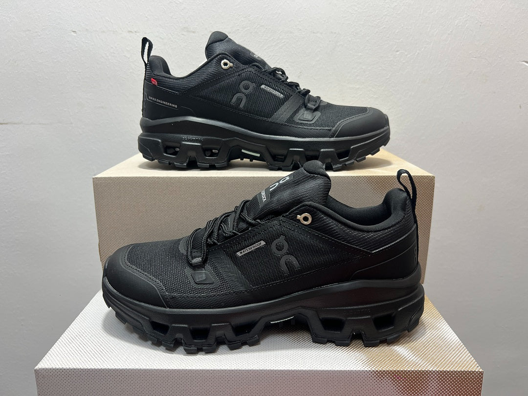 On Cloudrock Low Waterproof Hiking Shoes in All Black