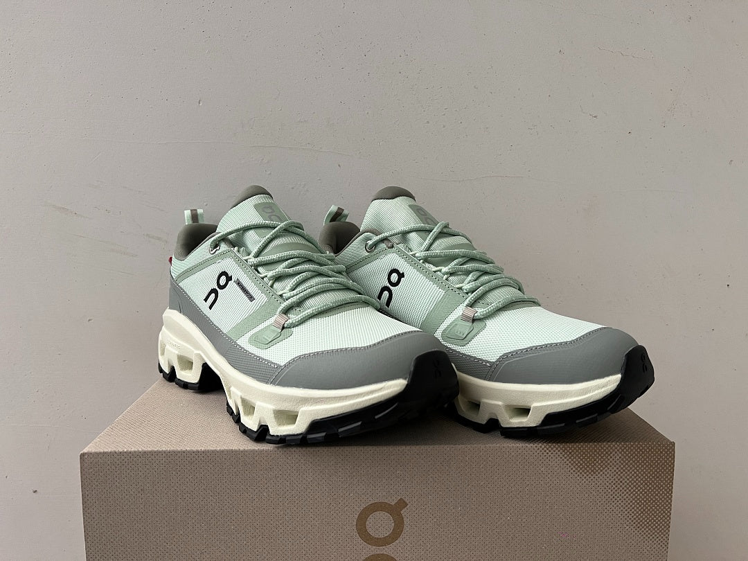 On Cloudrock Low Waterproof Hiking Shoes in Sage / Grey
