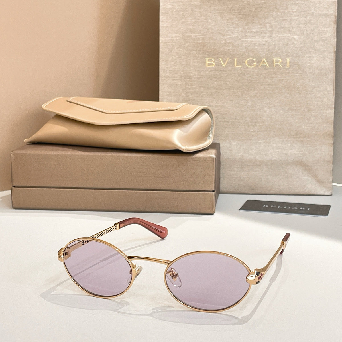 Bvlgari Serpenti Forever Luxury Oval Metal Sunglasses with Gold Frame and Gradient Grey Lenses