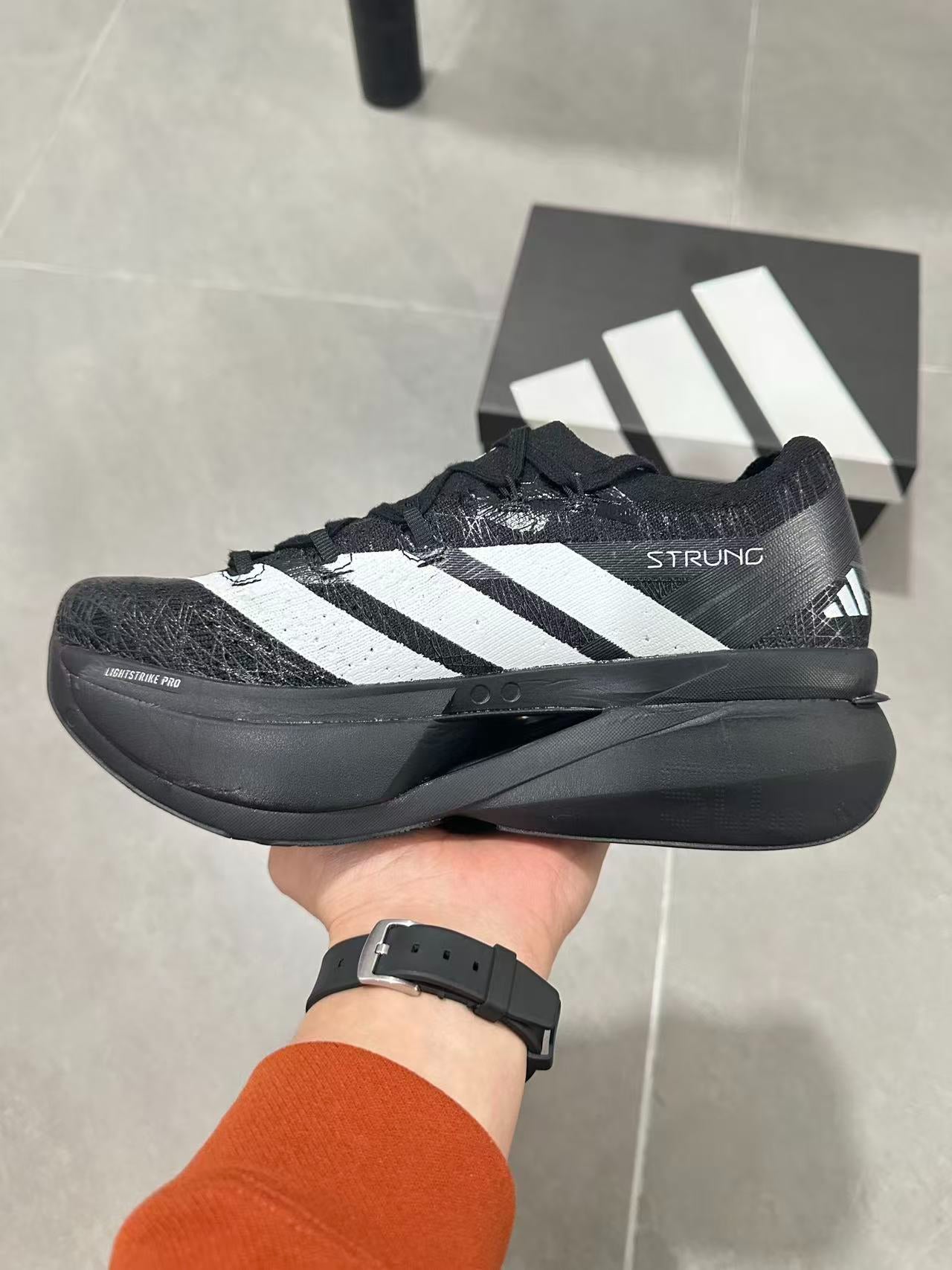 Adidas ADIZERO EVO SL Core Black / Cloud White colorway