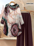 Jiawen Is Developing Trendy New Styles for Women'S Clothing in Europe And America, Featuring a Popular Round-Neck Printed Long-Sleeve Shirt with a High-Low Hem And Solid Color Long Pants Set