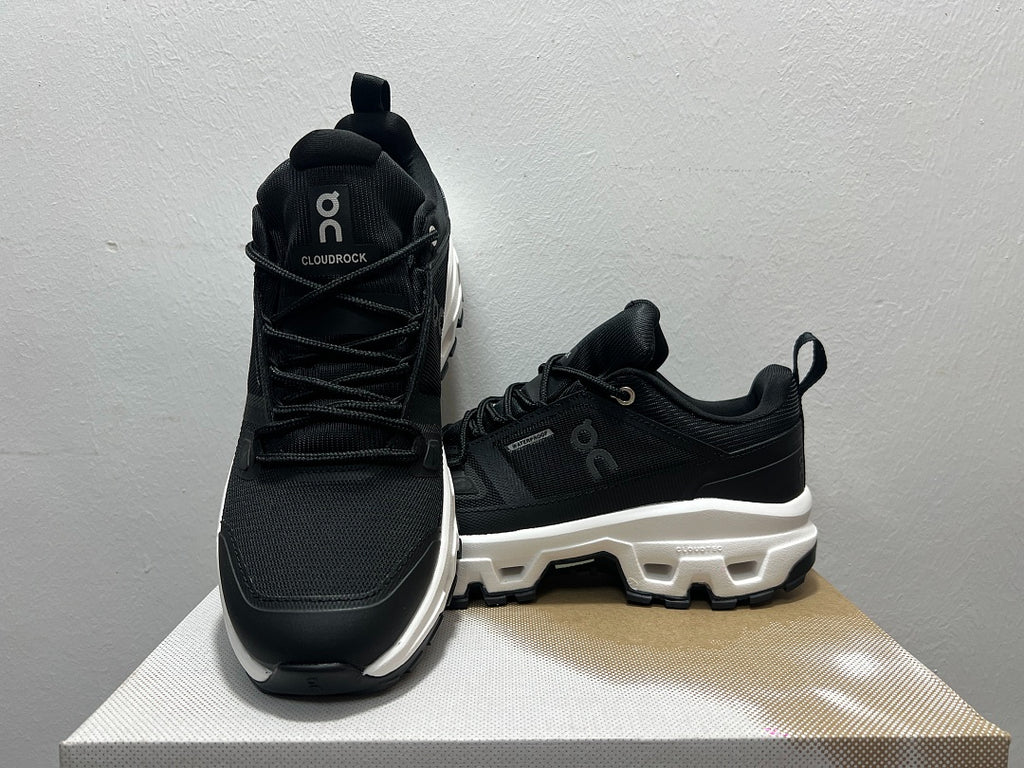 On Cloudrock Low Waterproof Hiking Shoes in Black / White