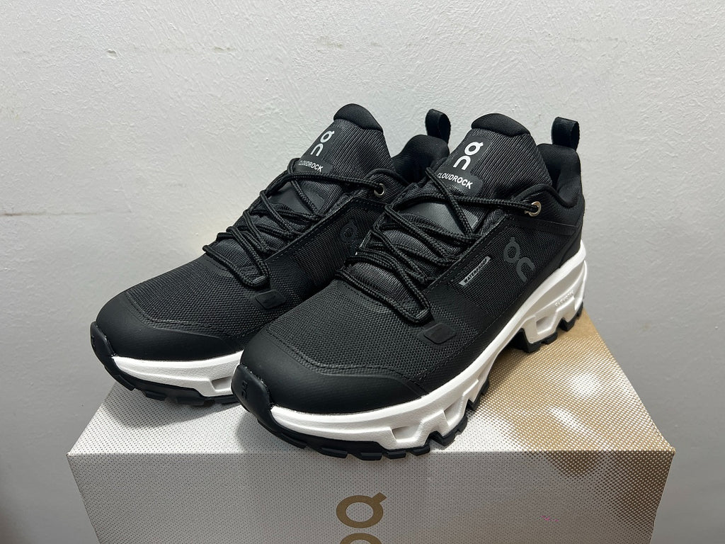 On Cloudrock Low Waterproof Hiking Shoes in Black / White