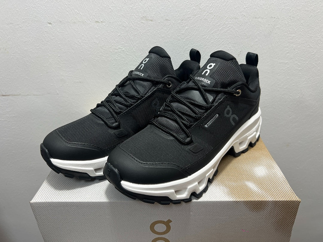 On Cloudrock Low Waterproof Hiking Shoes in Black / White