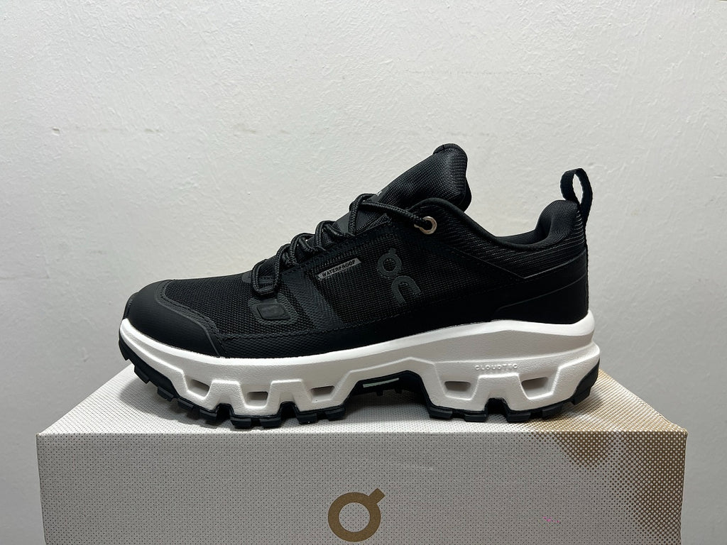 On Cloudrock Low Waterproof Hiking Shoes in Black / White
