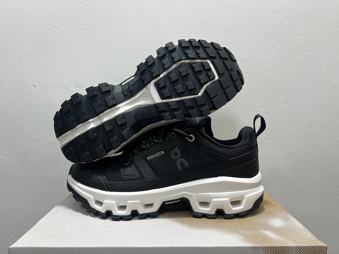 On Cloudrock Low Waterproof Hiking Shoes in Black / White