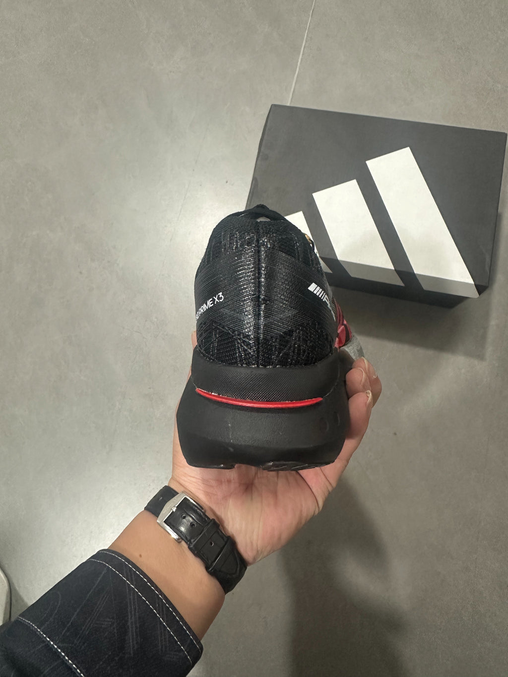 Adidas ADIZERO ADIOS PRO 4 (Core Black / Red / Silver colorway)