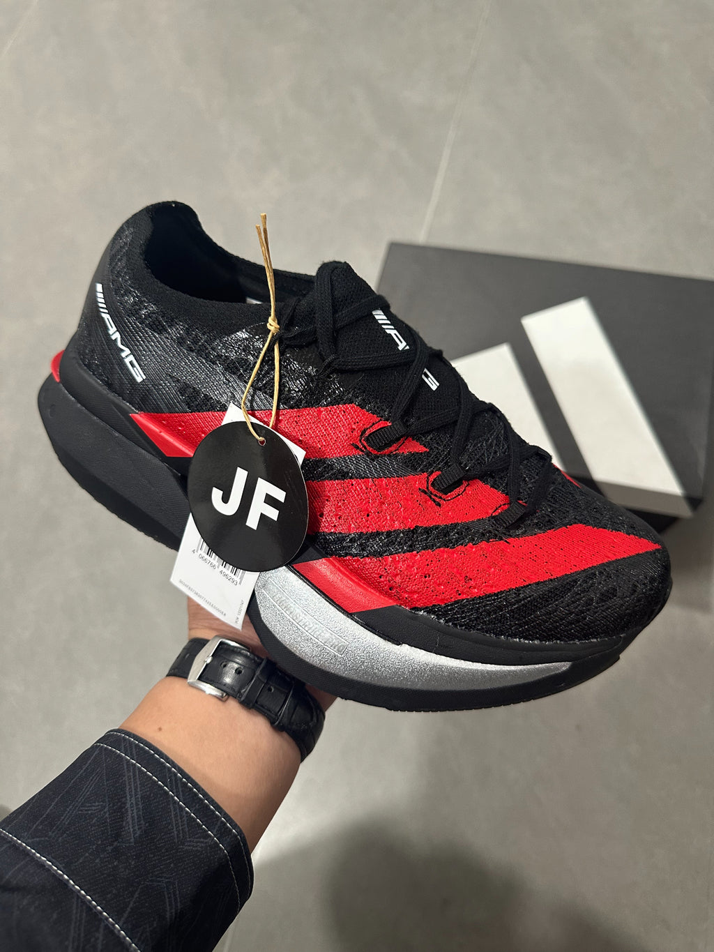 Adidas ADIZERO ADIOS PRO 4 (Core Black / Red / Silver colorway)