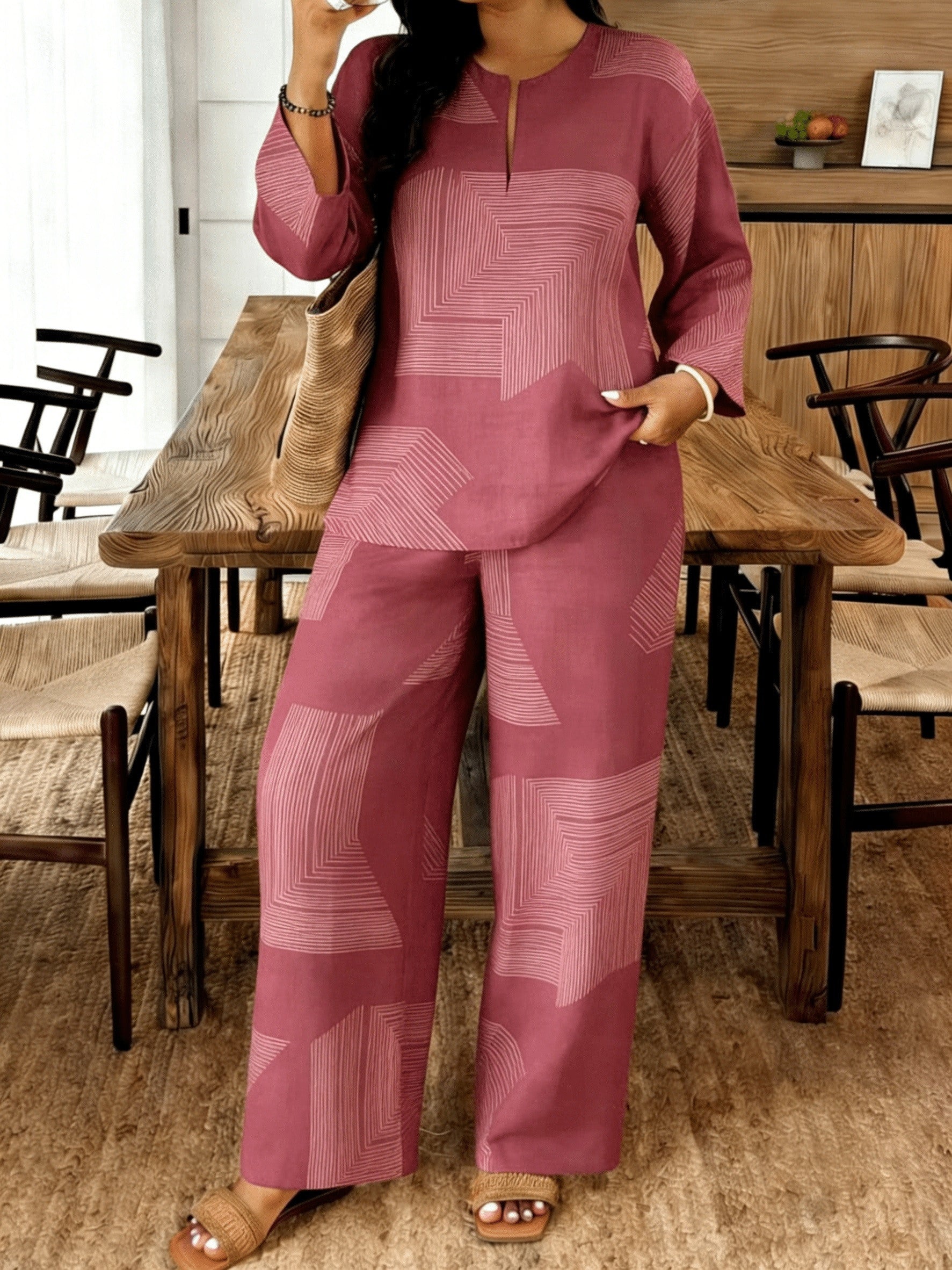 A Two-Piece Outfit for Women Featuring a Long-Sleeved Top And Long Pants, Perfect for Spring And Summer. This New Set Includes a V-Neck Shirt with a Print And Elastic Waist Pants, Offering Elegance And Comfort, Ideal for Commuting, Home Wear